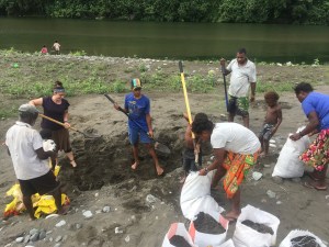 Shovelling Sand for Concrete
